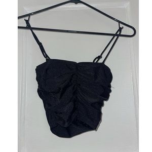 Black spaghetti top by Adika